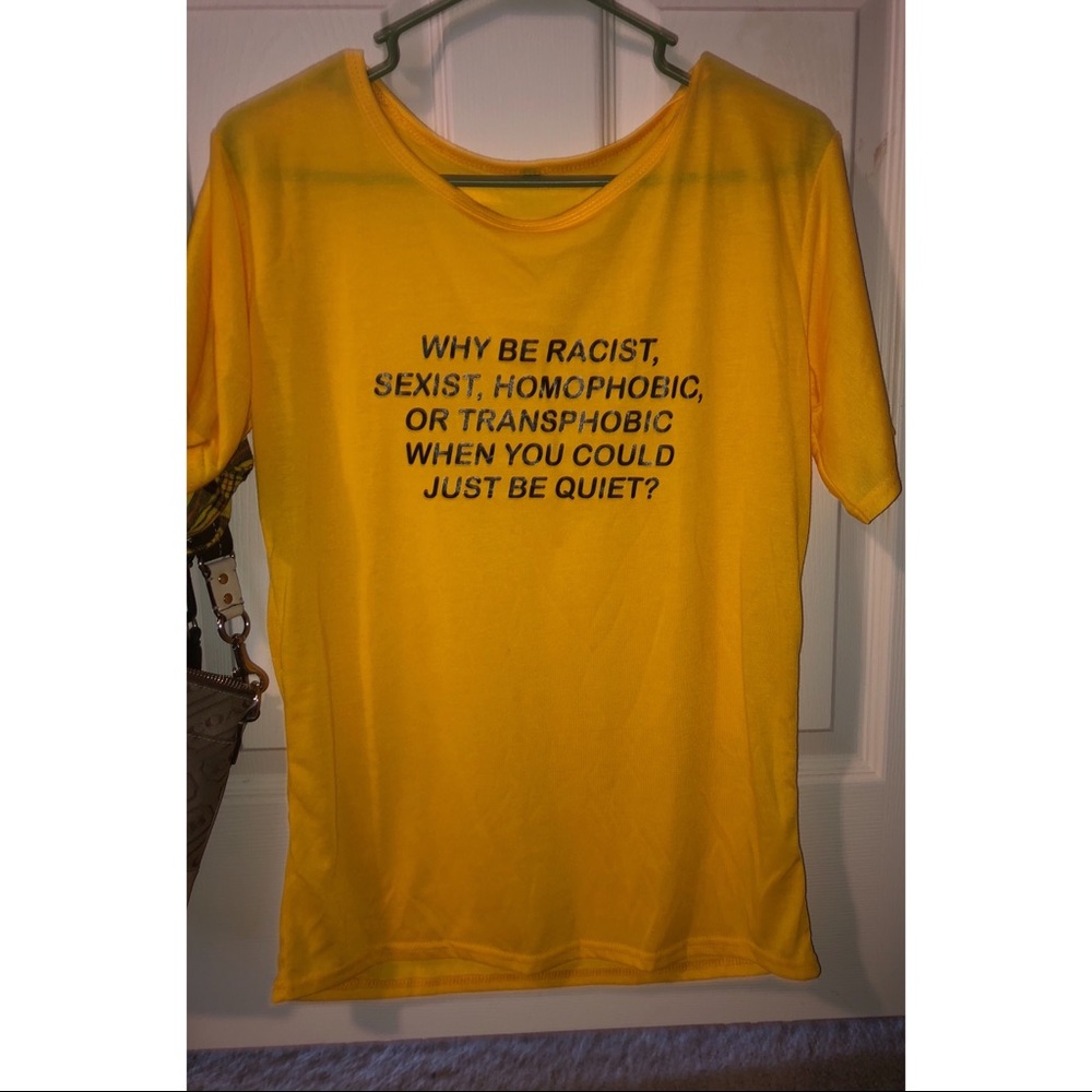 Plain yellow “why be racists...”